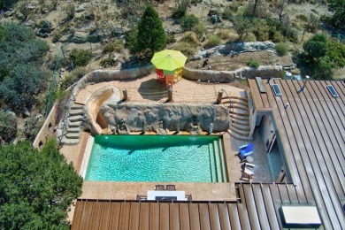 Welcome to this stunning Four Hills home with incredible city on The Canyon Club in New Mexico - for sale on GolfHomes.com, golf home, golf lot