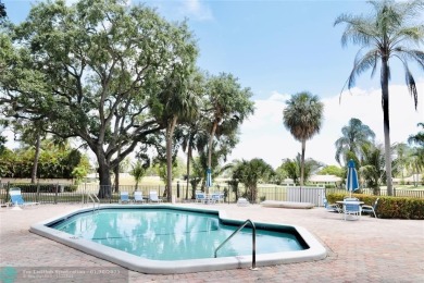 This updated 2-bedroom, 2-bathroom condo features an open on The Club at Emerald Hills in Florida - for sale on GolfHomes.com, golf home, golf lot