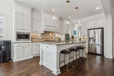 Step into luxury with this stunning one-story Highland-built on The Tribute At the Colony in Texas - for sale on GolfHomes.com, golf home, golf lot