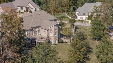 Experience luxury living in this stunning custom-built two-story on Paragould Country Club in Arkansas - for sale on GolfHomes.com, golf home, golf lot