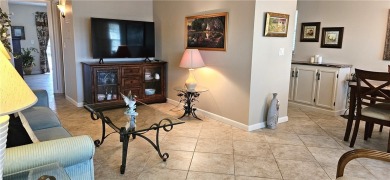 Furnished 1 bedroom-1.5 bath condo. 18* diagonal tile throughout on The American Golf Club in Florida - for sale on GolfHomes.com, golf home, golf lot