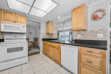This charming home offers approximately 1,450 square feet of on Mainlands Golf Club in Florida - for sale on GolfHomes.com, golf home, golf lot