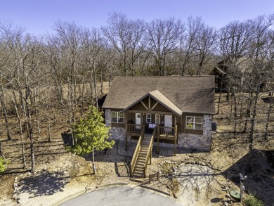 Welcome to this beautifully appointed lodge in the highly on Ledgestone Country Club and Golf Course in Missouri - for sale on GolfHomes.com, golf home, golf lot