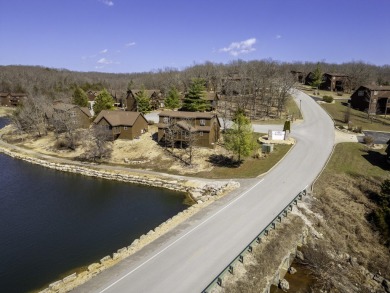 Welcome to this beautifully appointed lodge in the highly on Ledgestone Country Club and Golf Course in Missouri - for sale on GolfHomes.com, golf home, golf lot