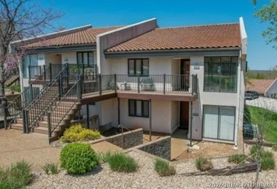 This ground-floor, 1-story, end unit offers plenty of room for on Seasons Ridge At Four Seasons in Missouri - for sale on GolfHomes.com, golf home, golf lot