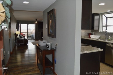 This ground-floor, 1-story, end unit offers plenty of room for on Seasons Ridge At Four Seasons in Missouri - for sale on GolfHomes.com, golf home, golf lot