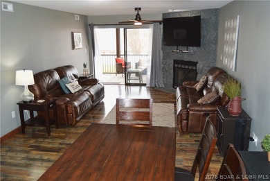 This ground-floor, 1-story, end unit offers plenty of room for on Seasons Ridge At Four Seasons in Missouri - for sale on GolfHomes.com, golf home, golf lot