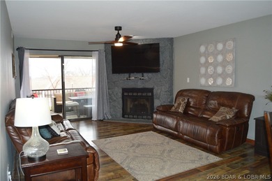 This ground-floor, 1-story, end unit offers plenty of room for on Seasons Ridge At Four Seasons in Missouri - for sale on GolfHomes.com, golf home, golf lot