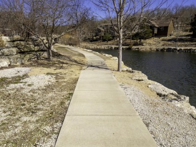 Welcome to this beautifully appointed lodge in the highly on Ledgestone Country Club and Golf Course in Missouri - for sale on GolfHomes.com, golf home, golf lot