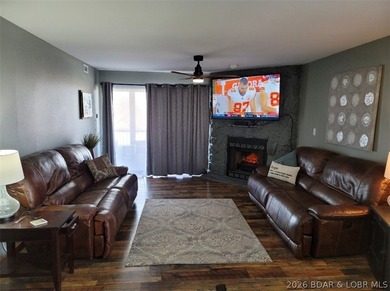 This ground-floor, 1-story, end unit offers plenty of room for on Seasons Ridge At Four Seasons in Missouri - for sale on GolfHomes.com, golf home, golf lot