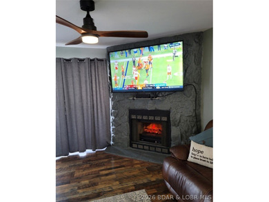 This ground-floor, 1-story, end unit offers plenty of room for on Seasons Ridge At Four Seasons in Missouri - for sale on GolfHomes.com, golf home, golf lot