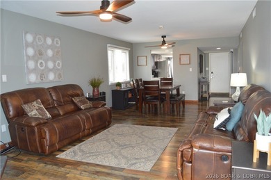 This ground-floor, 1-story, end unit offers plenty of room for on Seasons Ridge At Four Seasons in Missouri - for sale on GolfHomes.com, golf home, golf lot