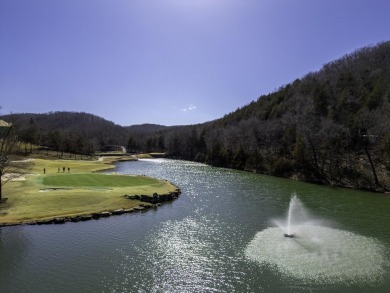 Welcome to this beautifully appointed lodge in the highly on Ledgestone Country Club and Golf Course in Missouri - for sale on GolfHomes.com, golf home, golf lot