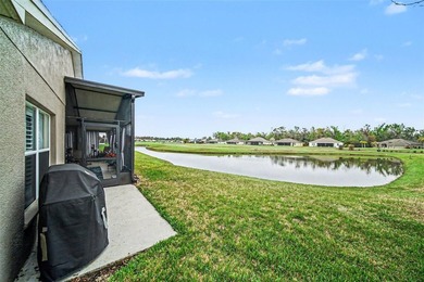 Enjoy beautiful golf course and pond views from this 2-bedroom on Tampa Bay Golf and Country Club in Florida - for sale on GolfHomes.com, golf home, golf lot