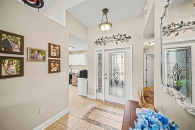 Enjoy beautiful golf course and pond views from this 2-bedroom on Tampa Bay Golf and Country Club in Florida - for sale on GolfHomes.com, golf home, golf lot