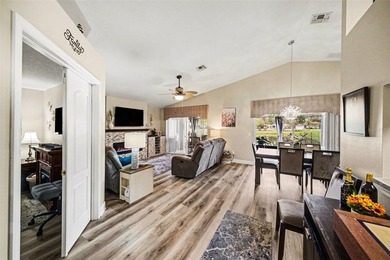 Enjoy beautiful golf course and pond views from this 2-bedroom on Tampa Bay Golf and Country Club in Florida - for sale on GolfHomes.com, golf home, golf lot