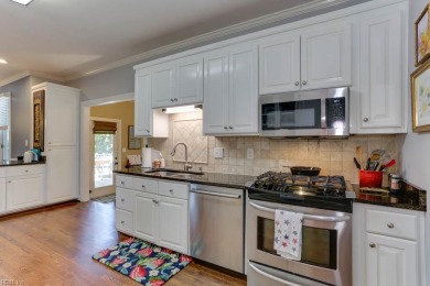 This lovely waterfront home is set on a quiet cul-de-sac on Cypress Point Country Club in Virginia - for sale on GolfHomes.com, golf home, golf lot