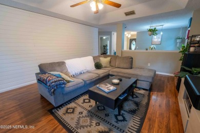 Fantastic pool home tucked away in a quiet Fort Caroline on Hidden Hills Country Club in Florida - for sale on GolfHomes.com, golf home, golf lot