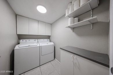 Laundry room with washer/dryer in unit. You read that correctly on Scottsdale Shadows in Arizona - for sale on GolfHomes.com, golf home, golf lot