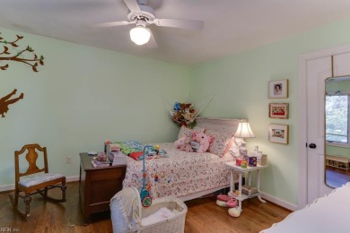 This lovely waterfront home is set on a quiet cul-de-sac on Cypress Point Country Club in Virginia - for sale on GolfHomes.com, golf home, golf lot