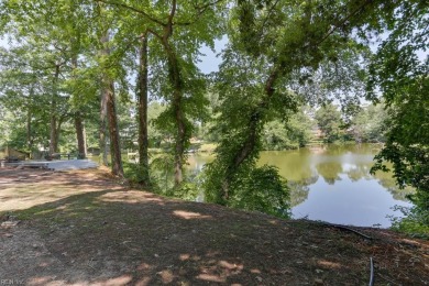 This lovely waterfront home is set on a quiet cul-de-sac on Cypress Point Country Club in Virginia - for sale on GolfHomes.com, golf home, golf lot