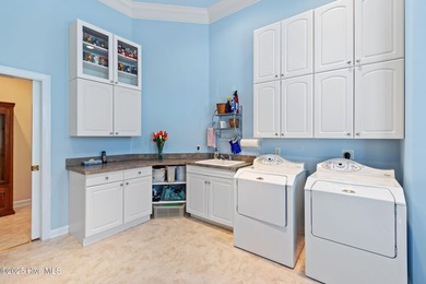 Stunning Custom Estate with Golf & Pond Views located on a on Members Club At St. James Plantation in North Carolina - for sale on GolfHomes.com, golf home, golf lot