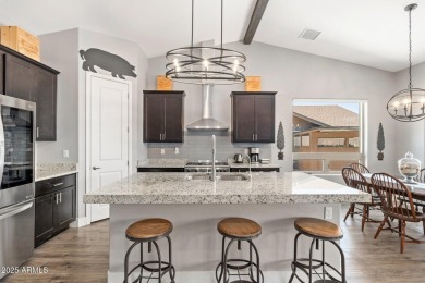 Discover luxury living in the prestigious gated community of on The Golf Club At Chaparral Pines in Arizona - for sale on GolfHomes.com, golf home, golf lot