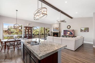Discover luxury living in the prestigious gated community of on The Golf Club At Chaparral Pines in Arizona - for sale on GolfHomes.com, golf home, golf lot