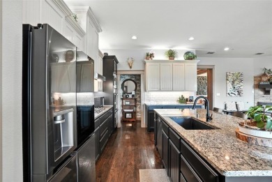 Welcome to 9211 Dahlia, a beautifully maintained two-story on Lantana Golf Club in Texas - for sale on GolfHomes.com, golf home, golf lot