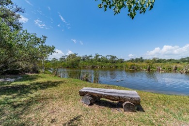 Charming Coastal Farmhouse on 1/2 Acre with Pond in Coveted on Lamar Golf Course in Texas - for sale on GolfHomes.com, golf home, golf lot