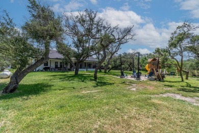 Charming Coastal Farmhouse on 1/2 Acre with Pond in Coveted on Lamar Golf Course in Texas - for sale on GolfHomes.com, golf home, golf lot