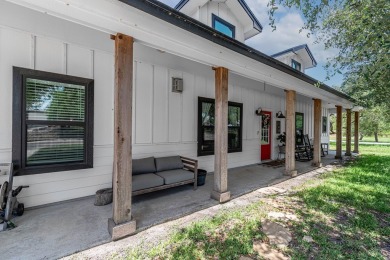 Charming Coastal Farmhouse on 1/2 Acre with Pond in Coveted on Lamar Golf Course in Texas - for sale on GolfHomes.com, golf home, golf lot