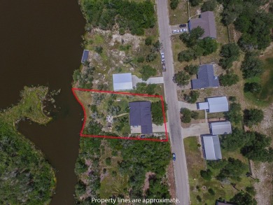 Charming Coastal Farmhouse on 1/2 Acre with Pond in Coveted on Lamar Golf Course in Texas - for sale on GolfHomes.com, golf home, golf lot
