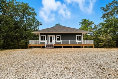 New construction, acreage, gated entry, and resort-style on The Club At Old Kinderhook in Missouri - for sale on GolfHomes.com, golf home, golf lot