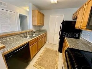 METROWEST FIRST FLOOR 2/2 CONDO IN GATED COMMUNITY. CLOSE TO ALL on MetroWest Golf Club in Florida - for sale on GolfHomes.com, golf home, golf lot