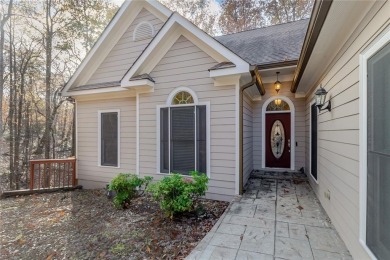 Nestled on a large, private, wooded lot in the serene Bent Tree on Bent Tree Golf Course in Georgia - for sale on GolfHomes.com, golf home, golf lot