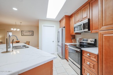 Light Bright furnished PUD in great location. Walking distance on Stardust Golf Course in Arizona - for sale on GolfHomes.com, golf home, golf lot