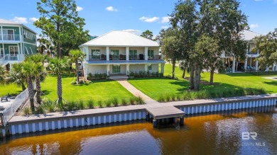 Tucked along one of Orange Beach's most sought-after waterfront on Orange Beach Golf Center in Alabama - for sale on GolfHomes.com, golf home, golf lot