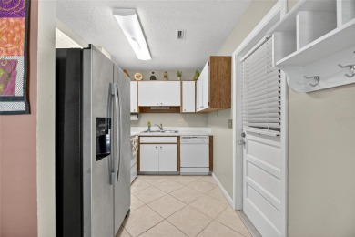 Bright  Private End Unit in 55+ - 2BR + Den + Office + Extra on Sandpiper Golf Club in Florida - for sale on GolfHomes.com, golf home, golf lot