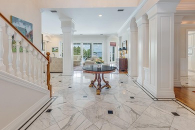 Timeless elegance on the bay behind the gates of prestigious on Regatta Bay Golf and Country Club in Florida - for sale on GolfHomes.com, golf home, golf lot