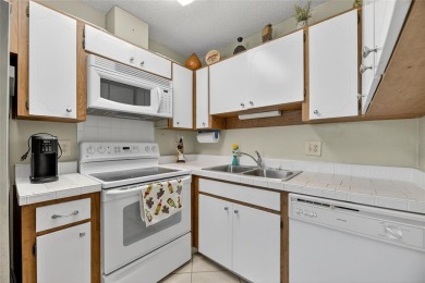 Bright  Private End Unit in 55+ - 2BR + Den + Office + Extra on Sandpiper Golf Club in Florida - for sale on GolfHomes.com, golf home, golf lot
