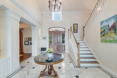 Timeless elegance on the bay behind the gates of prestigious on Regatta Bay Golf and Country Club in Florida - for sale on GolfHomes.com, golf home, golf lot