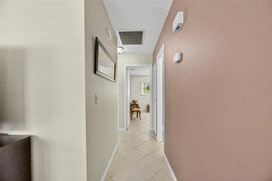 Bright  Private End Unit in 55+ - 2BR + Den + Office + Extra on Sandpiper Golf Club in Florida - for sale on GolfHomes.com, golf home, golf lot