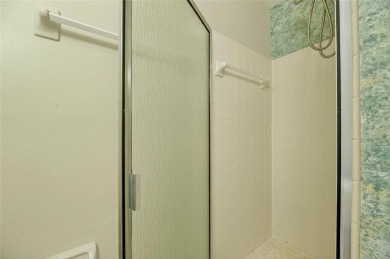 Bright  Private End Unit in 55+ - 2BR + Den + Office + Extra on Sandpiper Golf Club in Florida - for sale on GolfHomes.com, golf home, golf lot