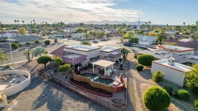 Discover this stunningly remodeled home, perfectly situated on a on Briarwood Country Club in Arizona - for sale on GolfHomes.com, golf home, golf lot