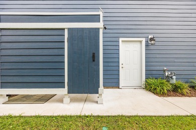 Discover luxury coastal living in this 5-bedroom, 3.5-bath on Surf Golf and Beach Club in South Carolina - for sale on GolfHomes.com, golf home, golf lot