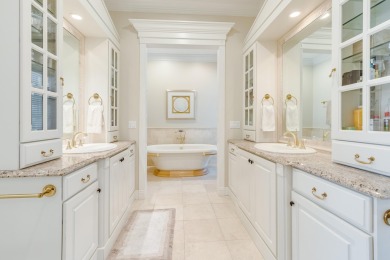 Timeless elegance on the bay behind the gates of prestigious on Regatta Bay Golf and Country Club in Florida - for sale on GolfHomes.com, golf home, golf lot