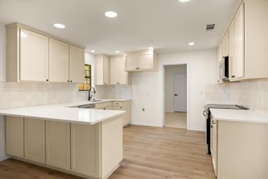 Welcome to this beautifully renovated home nestled in the heart on Pecan Plantation Country Club in Texas - for sale on GolfHomes.com, golf home, golf lot