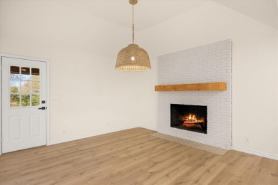 Welcome to this beautifully renovated home nestled in the heart on Pecan Plantation Country Club in Texas - for sale on GolfHomes.com, golf home, golf lot