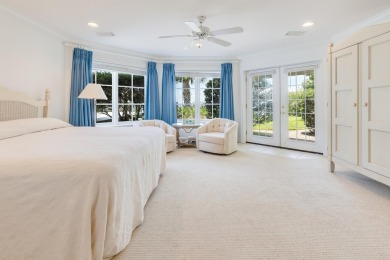 Timeless elegance on the bay behind the gates of prestigious on Regatta Bay Golf and Country Club in Florida - for sale on GolfHomes.com, golf home, golf lot
